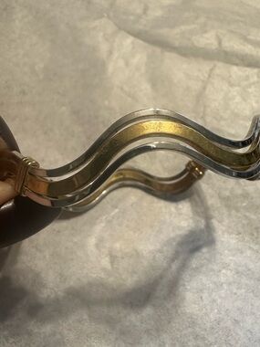 Avon Two-Tone Wavy Bangle Bracelet in Gold and Silver